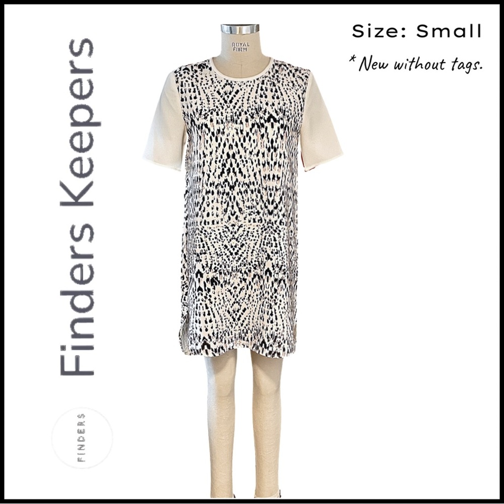 Finders Keepers Comfortable Dress w/ Dolphin Hem. Perfect for Day to Night!